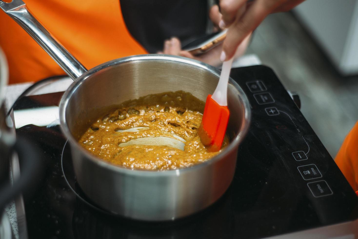 Caramel in a saucepan photo