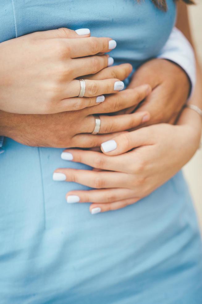 Couple embracing in blue photo