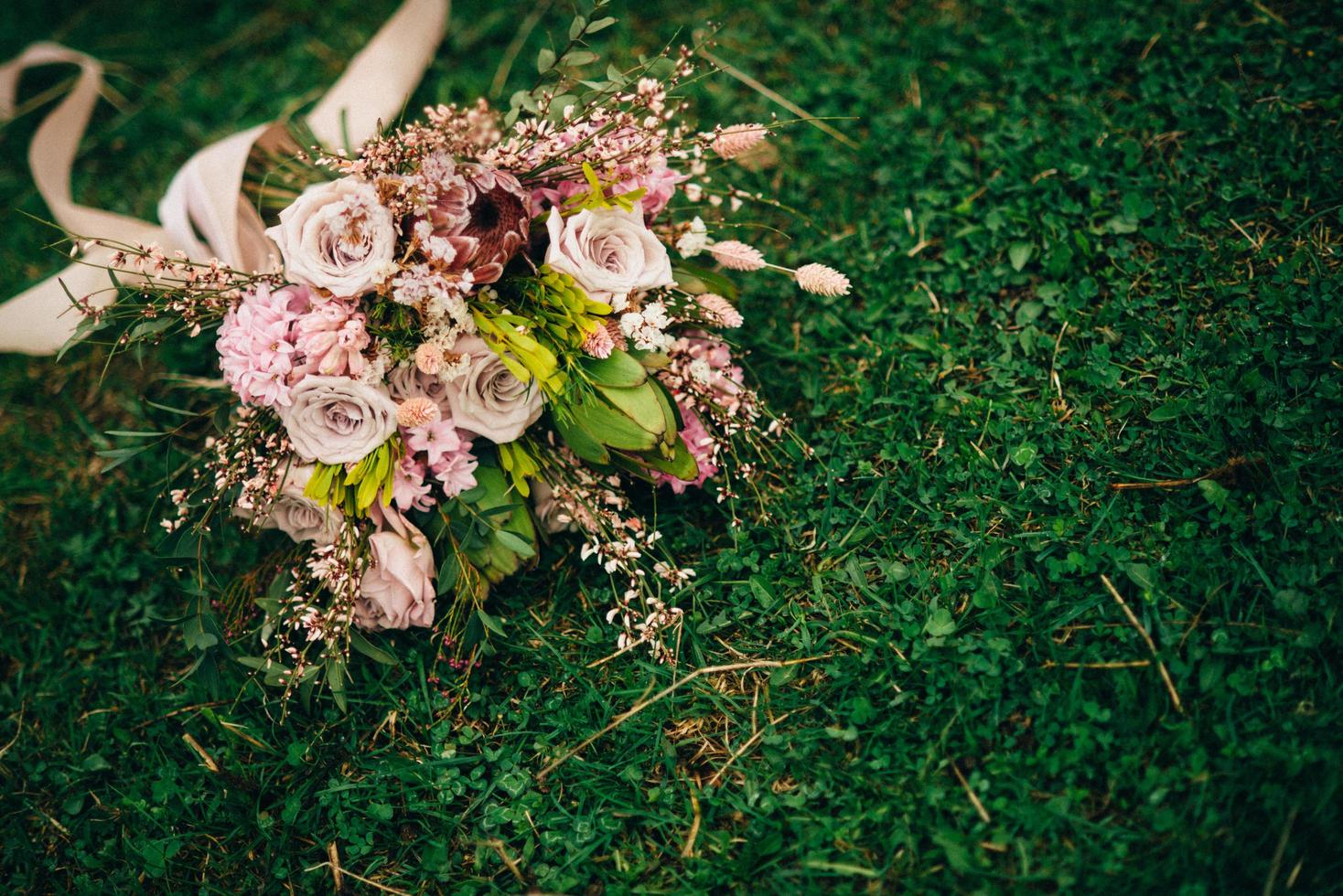 Bouquet on green grass photo