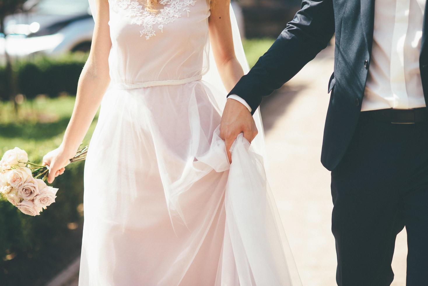 Brid and groom walking photo