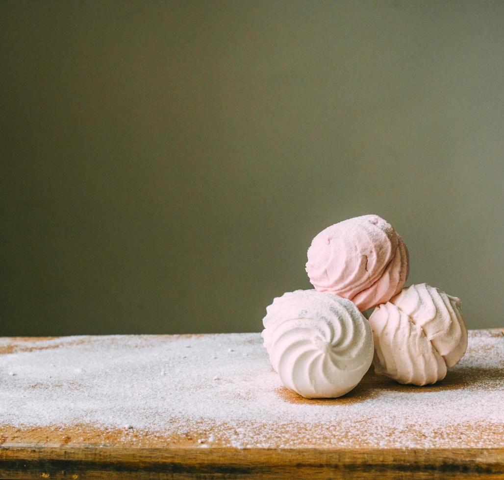 Marshmallows desserts on table photo