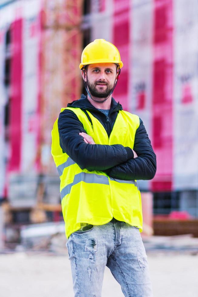 ingeniero trabajador de la construcción de edificios foto