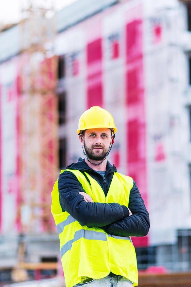 ingeniero trabajador de la construcción de edificios foto