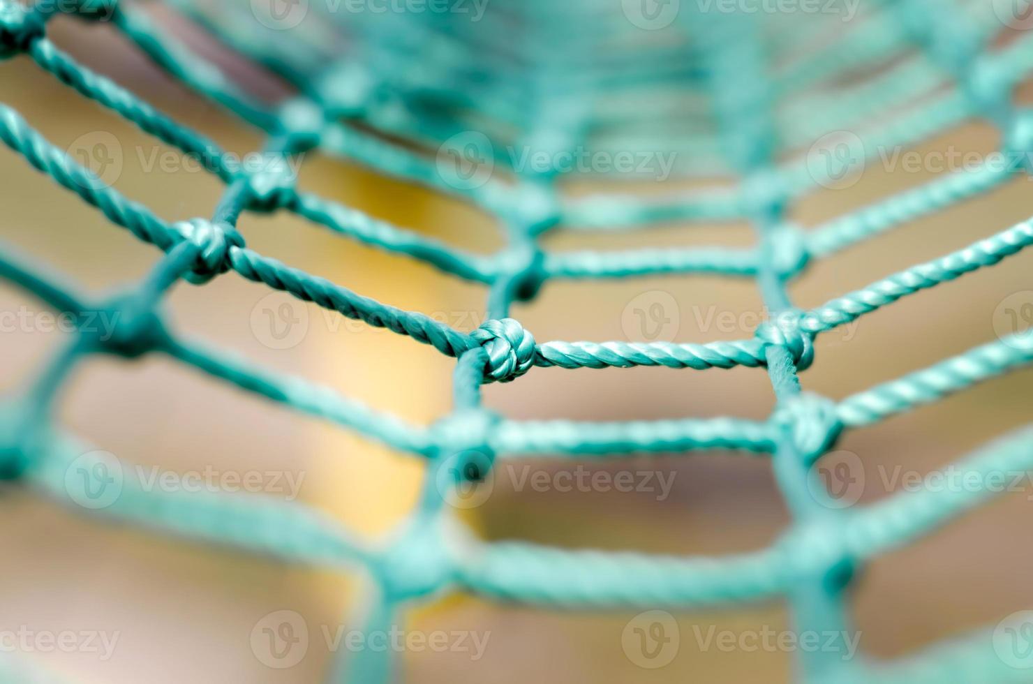 Close-up of green mesh rope photo