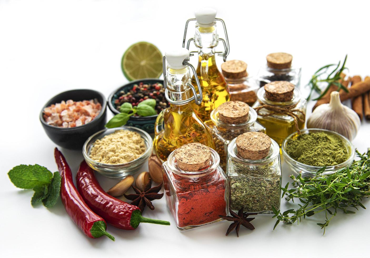 Various spices isolated on white background, top view photo