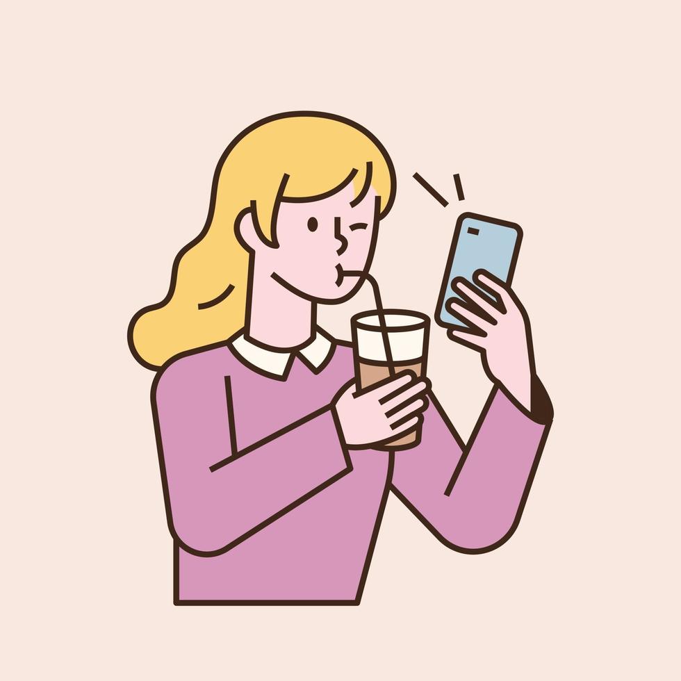 A girl is drinking a drink with a straw and looking at the phone. flat design style minimal vector illustration.