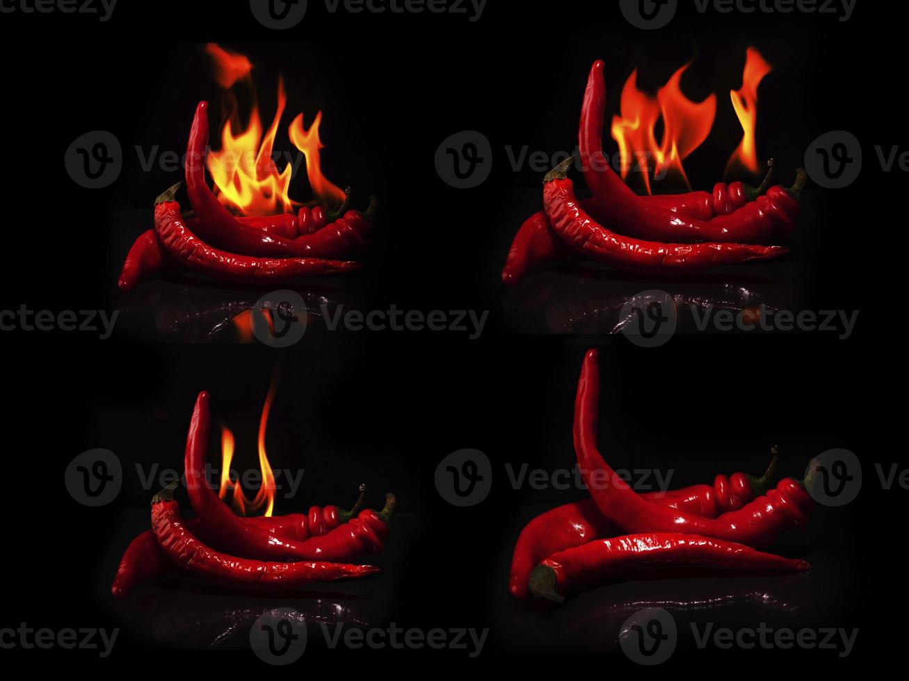 Hot chili peppers with fire on dark background photo