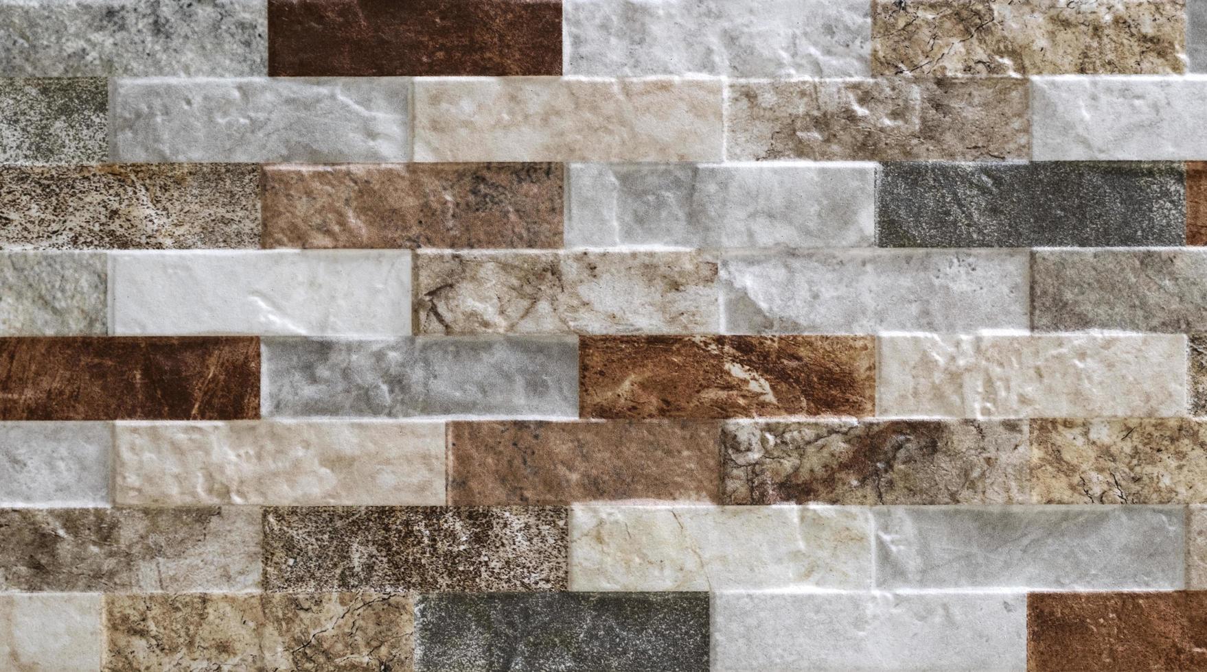 Decoración de piedra de fachada natural textura de fondo de cuarcita. muro de piedra de granito moderno foto