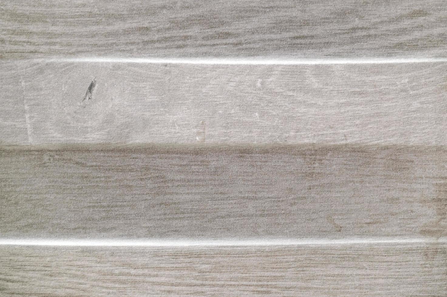 Wood-coloured porcelain texture with non-uniform relief photo