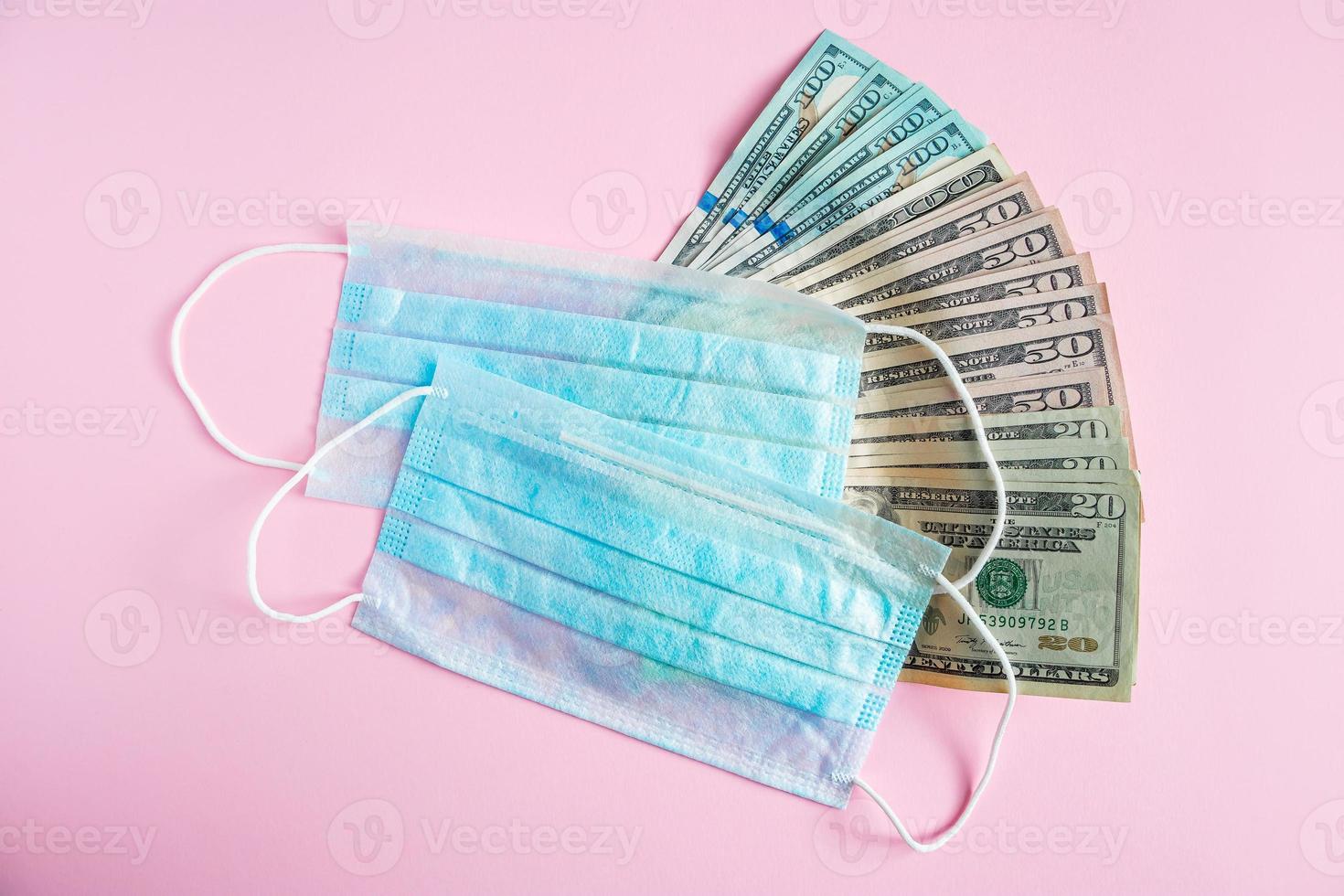 Medical mask and money photo