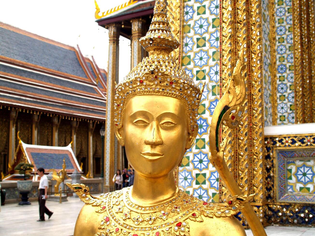 Bangkok, Thailand, 2021 - Golden statue at The Wat Phra Kaew photo