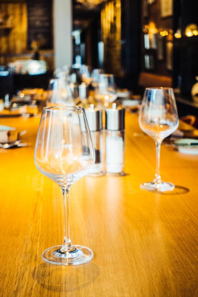 Wine glass on table photo
