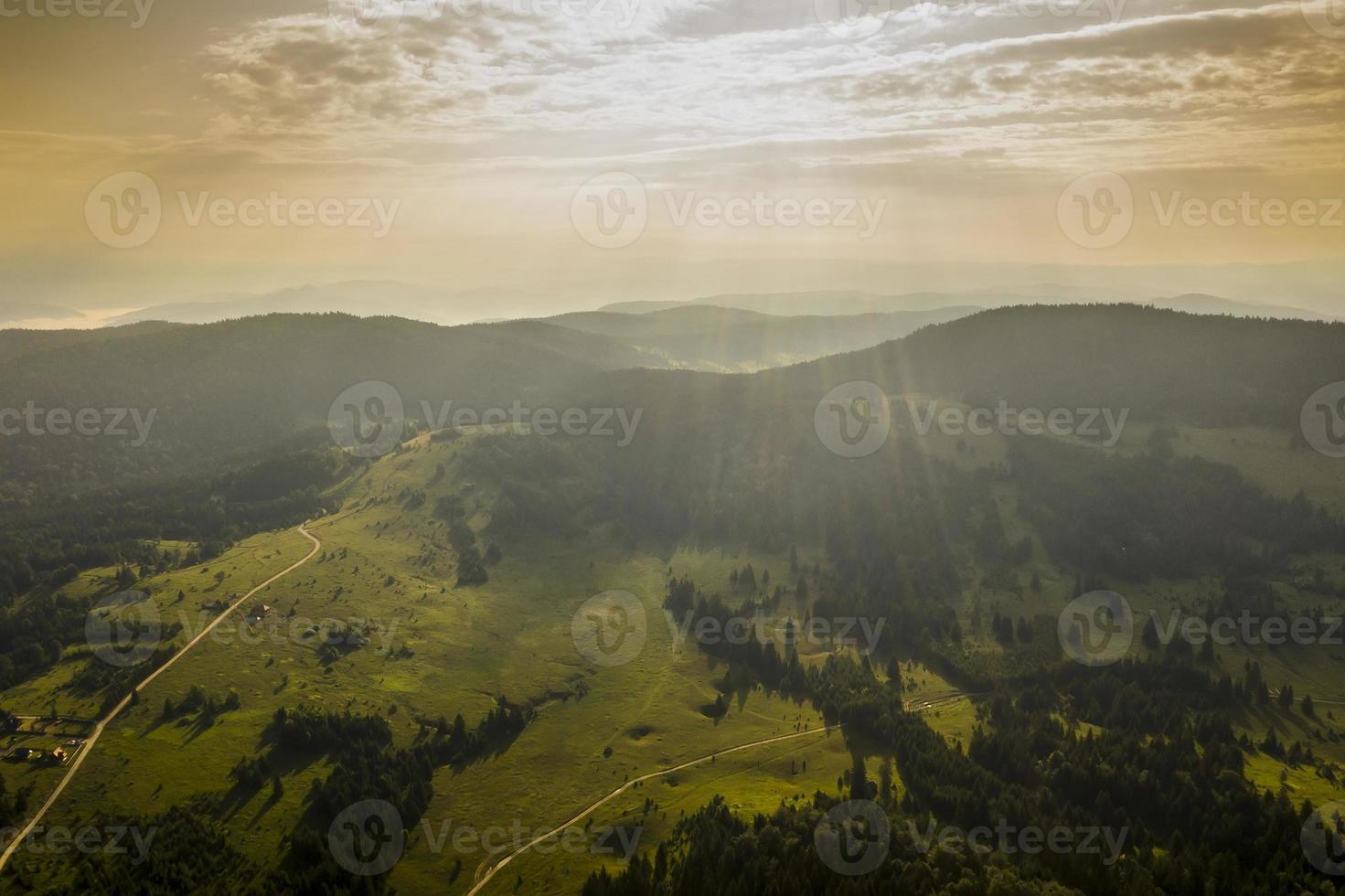 Aerial view at mountain forest on a summer day photo