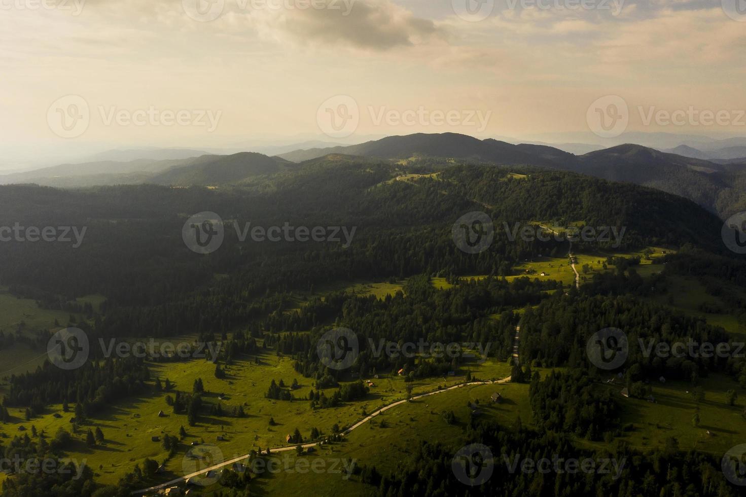 Aerial view at mountain forest on a summer day photo