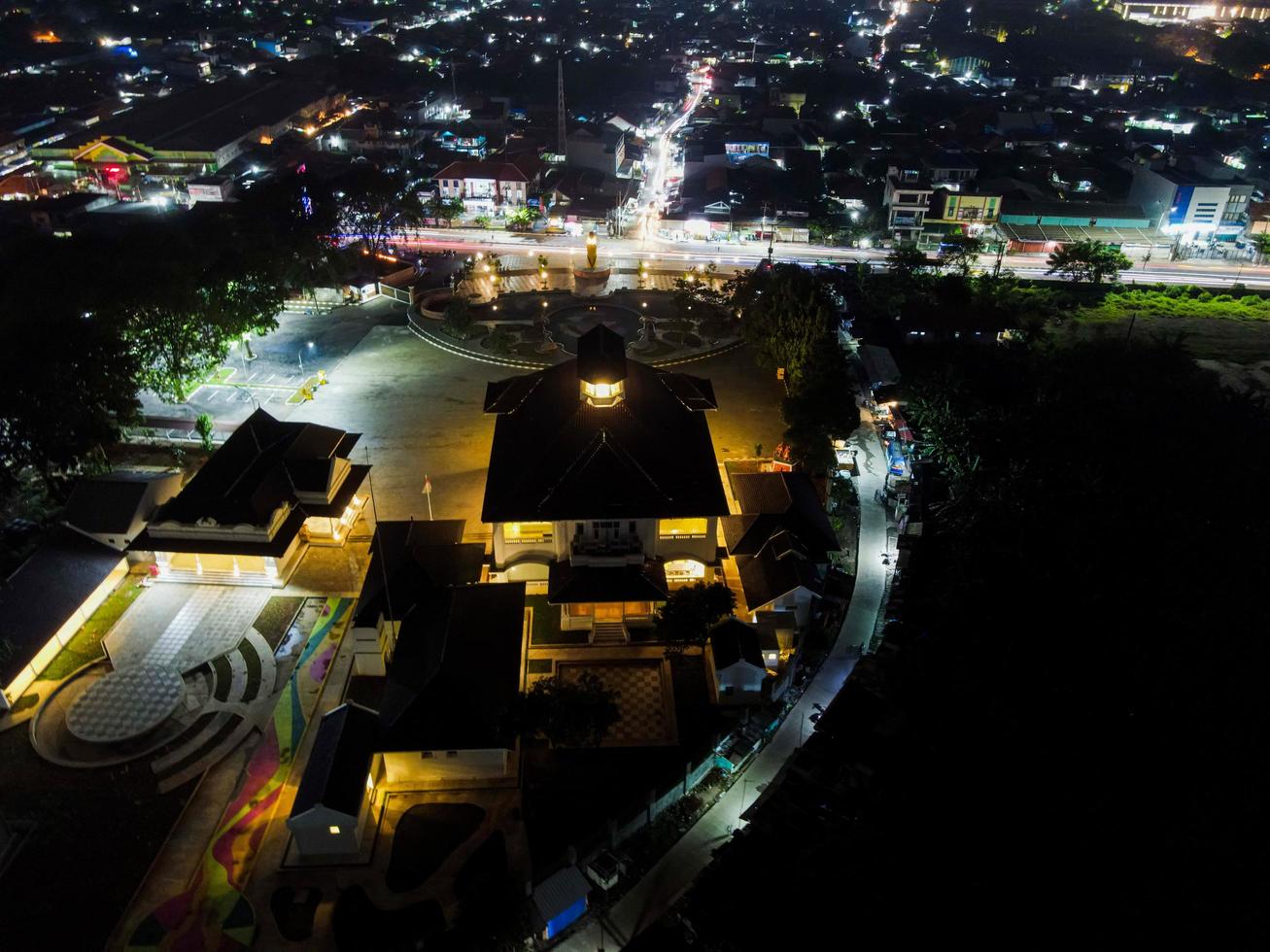 Bekasi, Indonesia 2021- Aerial drone view of Monument Gedung Juang, one of the historical buildings in Tambun at night photo