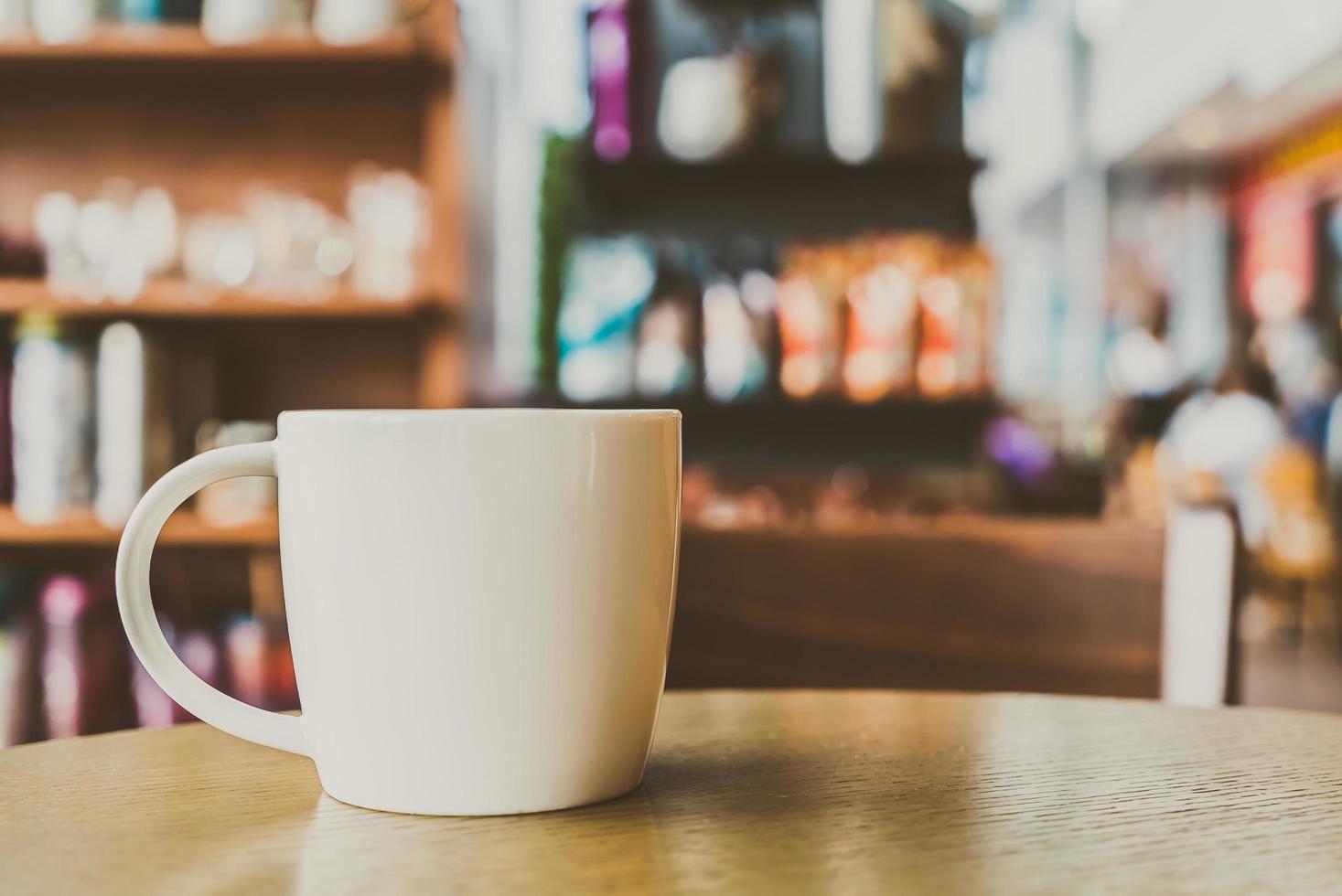 White coffee cup in a cafe photo