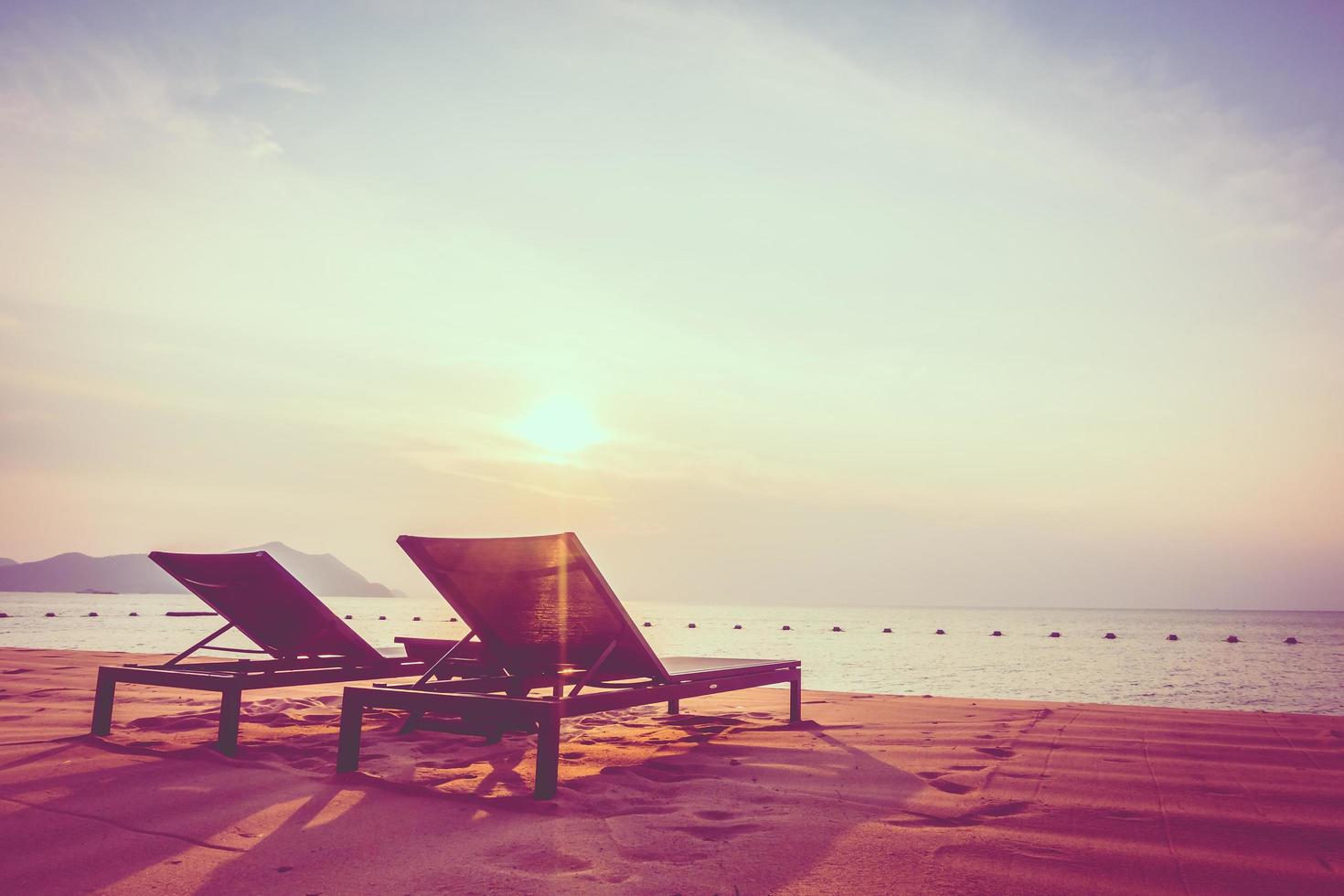 Sunbathing beds on the beach photo