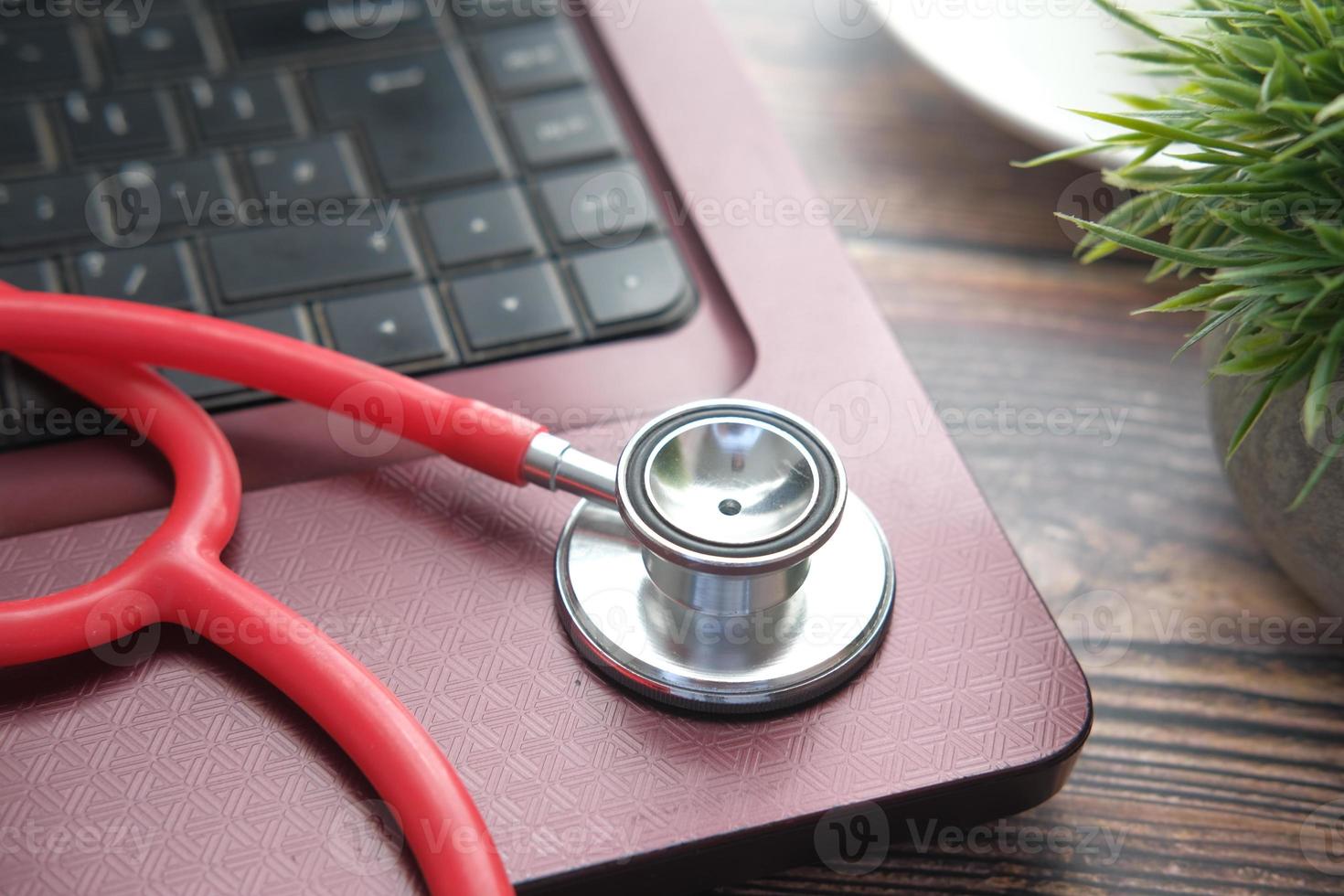 Stethoscope on laptop photo