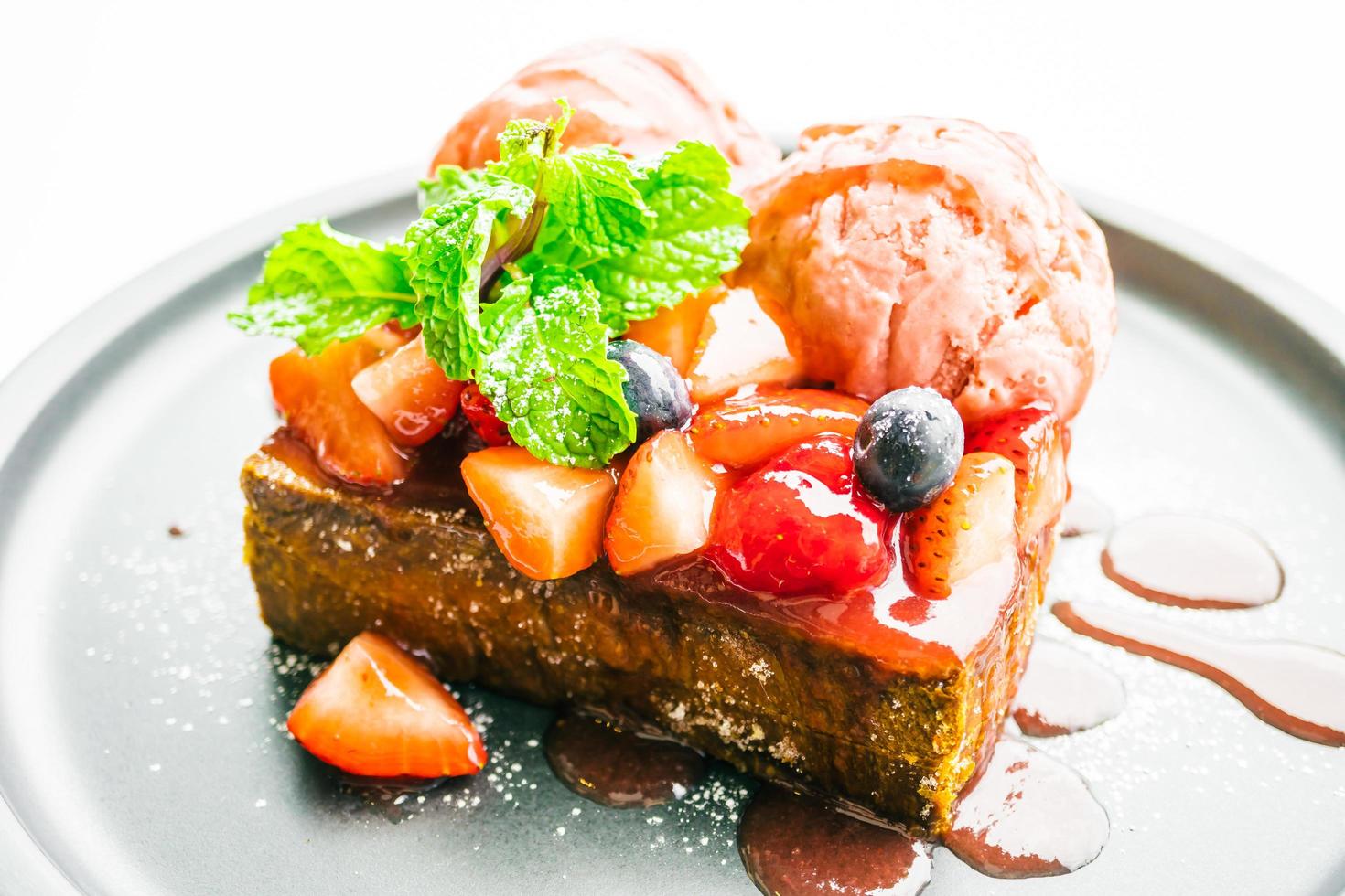 Sweet dessert with honey toast with strawberry and jam photo