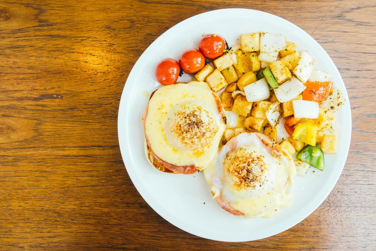 Egg benedict with vegetable for breakfast photo