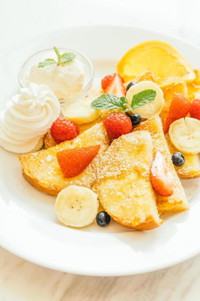 Pancake and Bread toast with mixed fruit photo