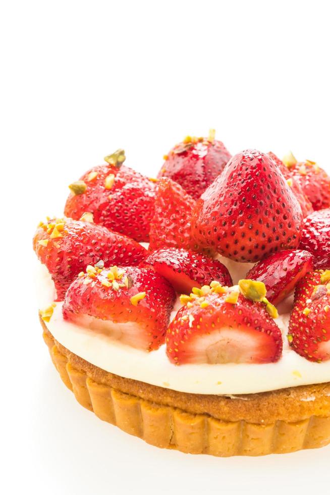 Sweet dessert with strawberry on top of tart photo