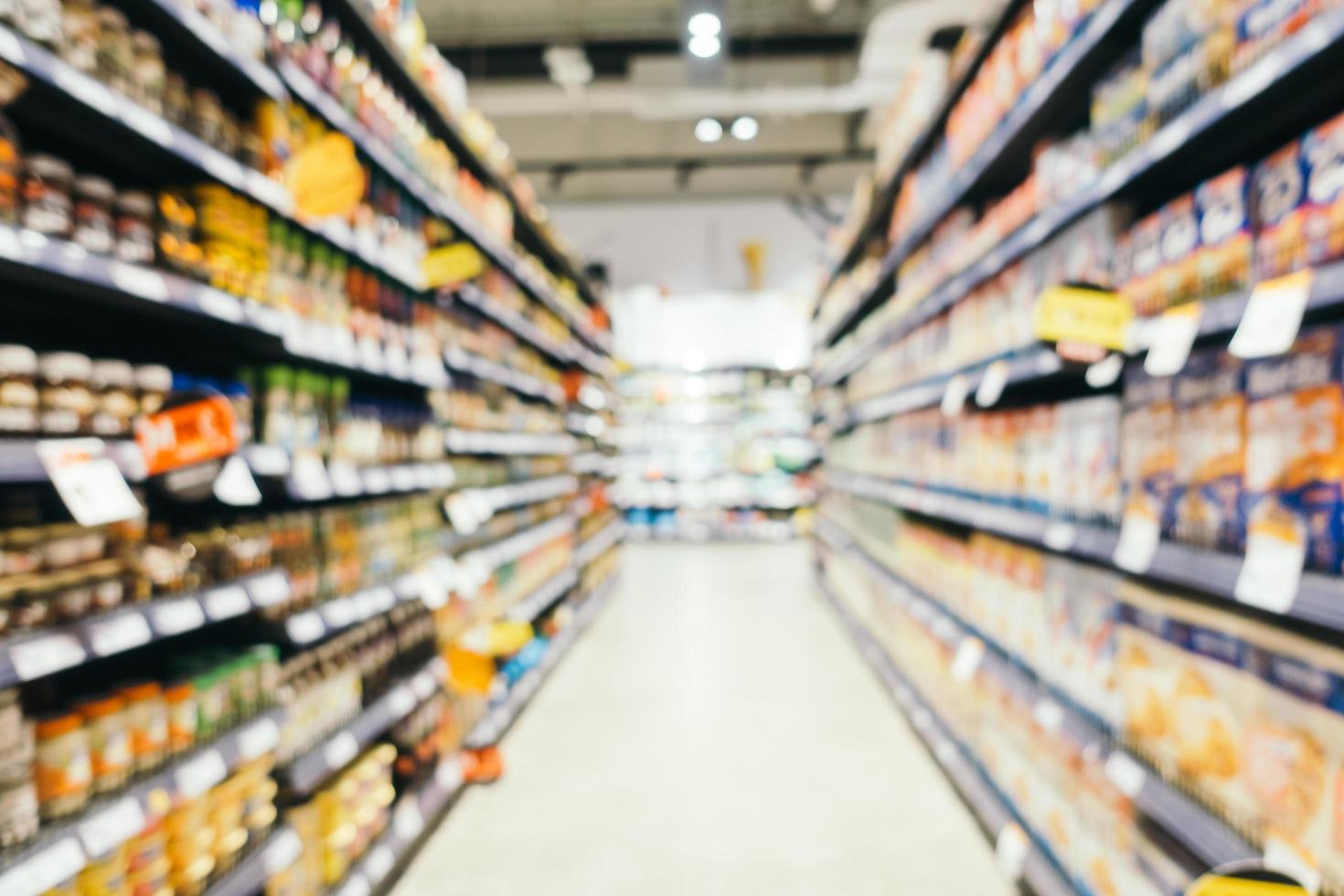 Desenfoque abstracto y compras de supermercado desenfocado en grandes almacenes foto