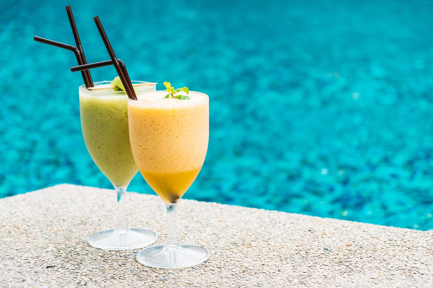 Smoothies with pool background photo