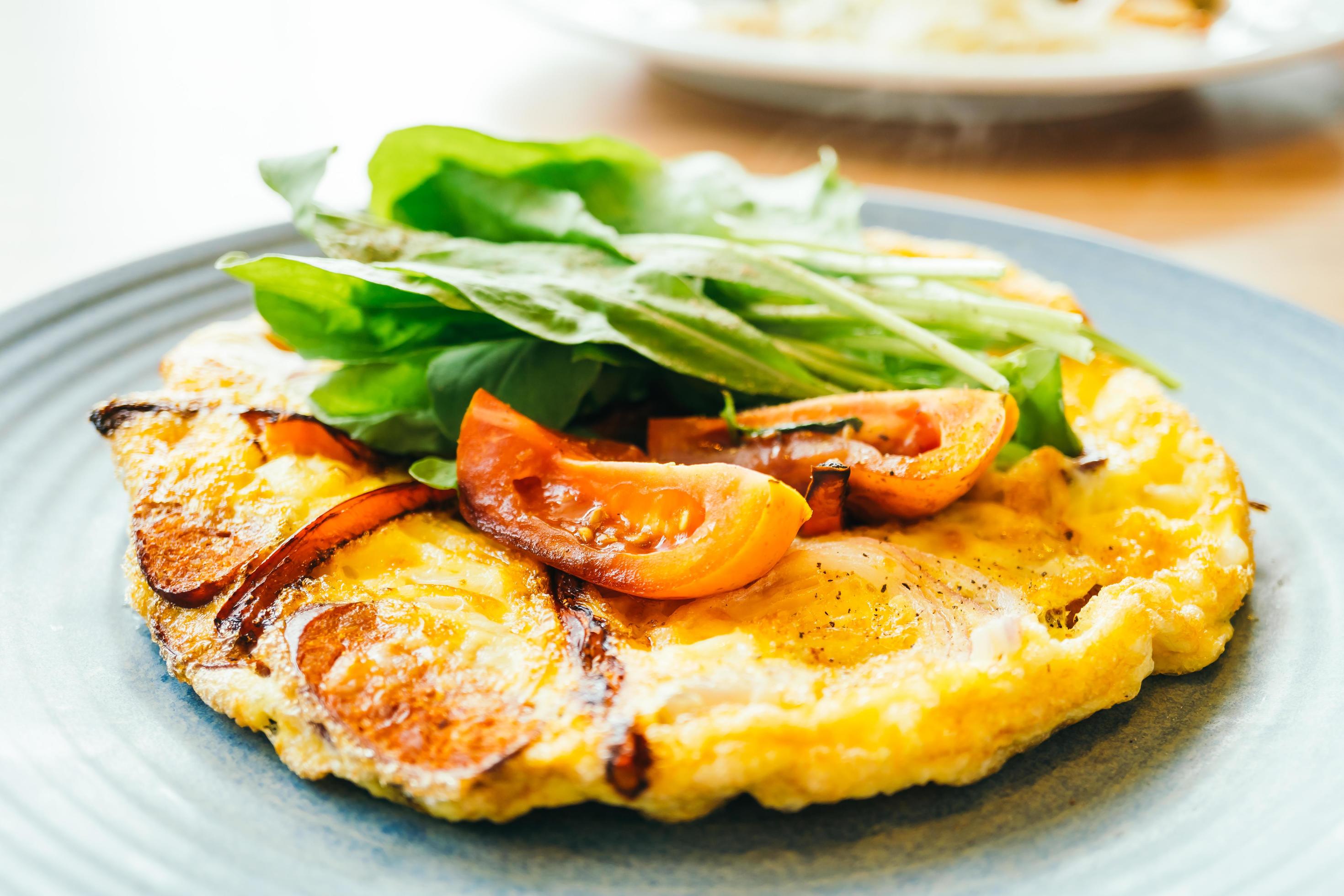 Fried eggs omelette in white plate 2266891 Stock Photo at Vecteezy