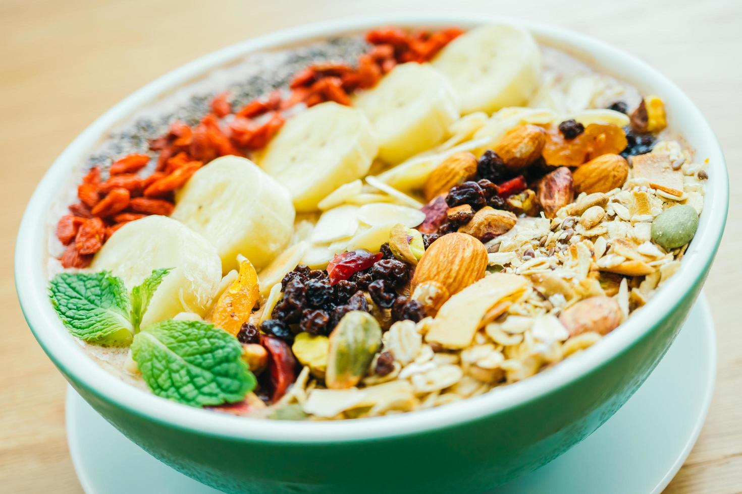 Mixed fruit with muesli and granola photo