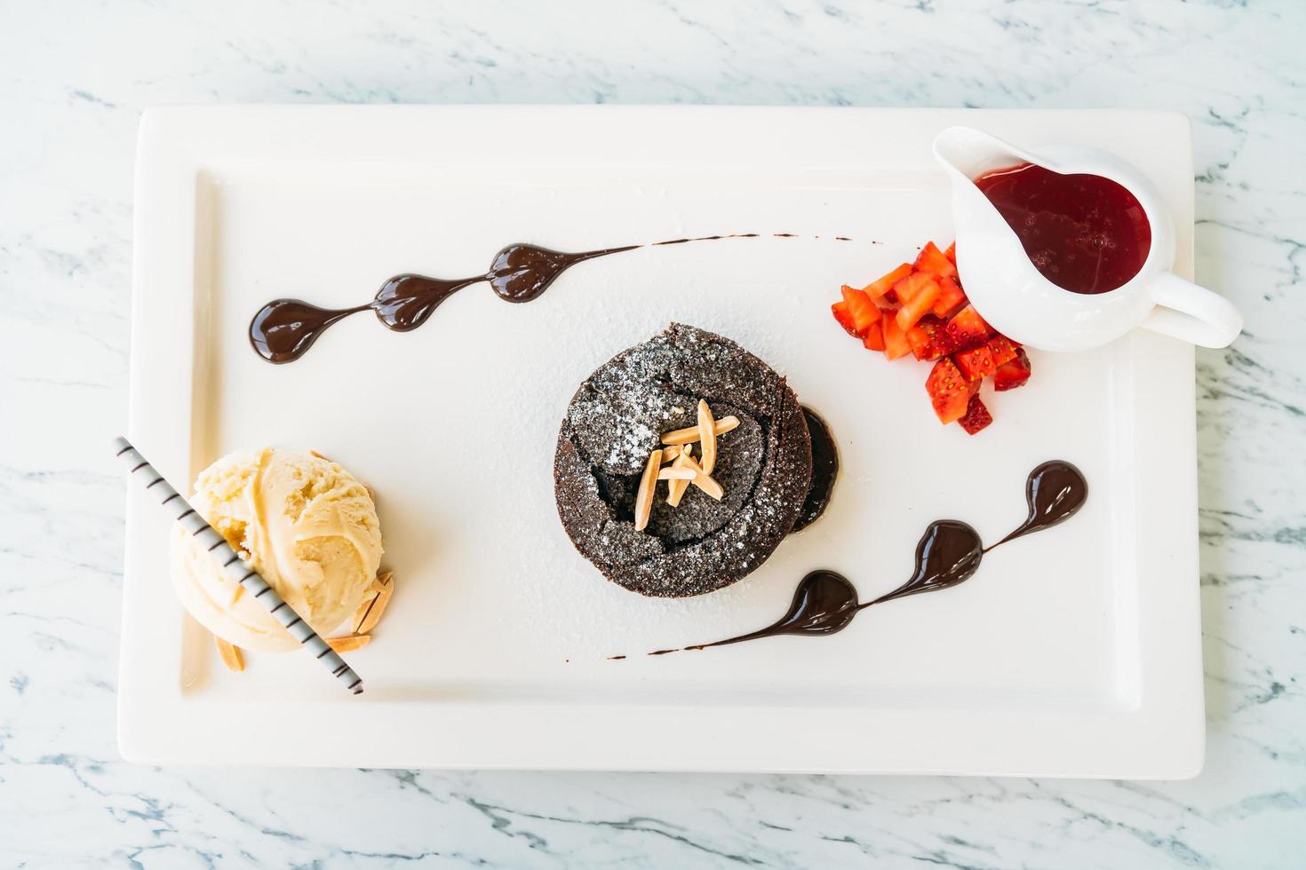 Sweet dessert with chocolate lava cake and ice cream photo