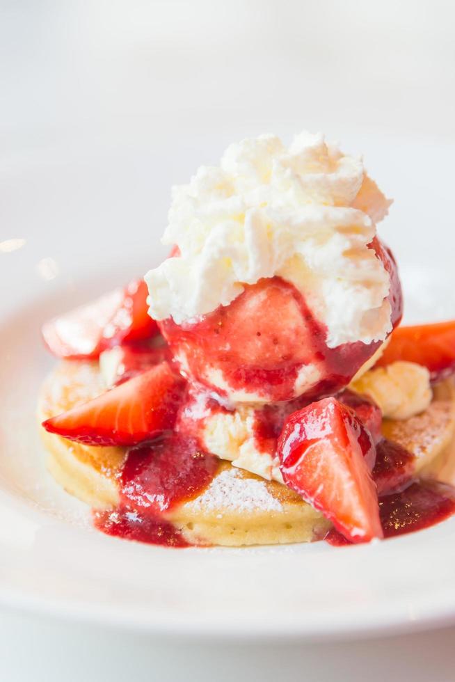 Pancakes with strawberry and ice cream photo