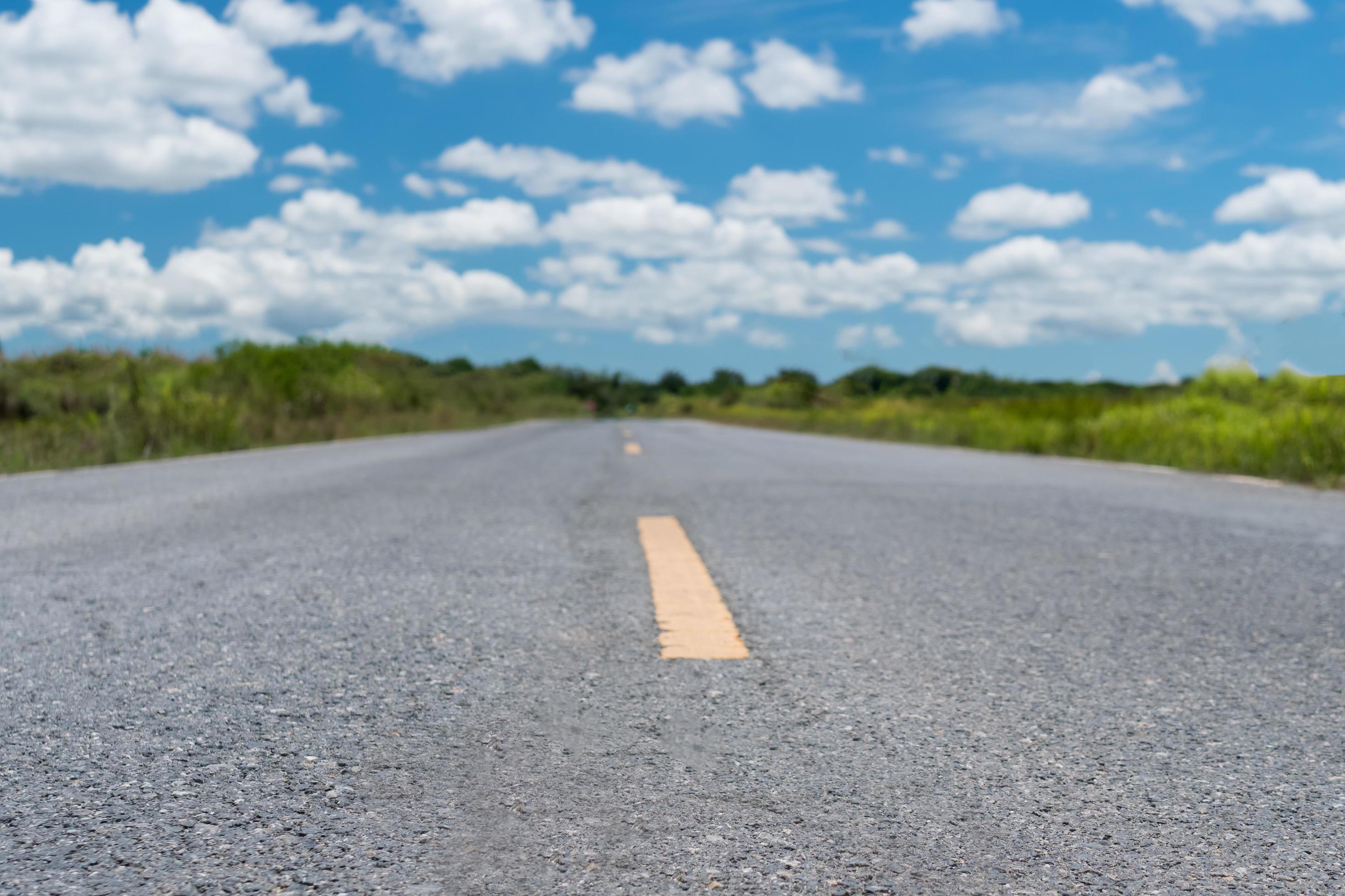 Small country road with blue sky background 2267846 Stock Photo at Vecteezy