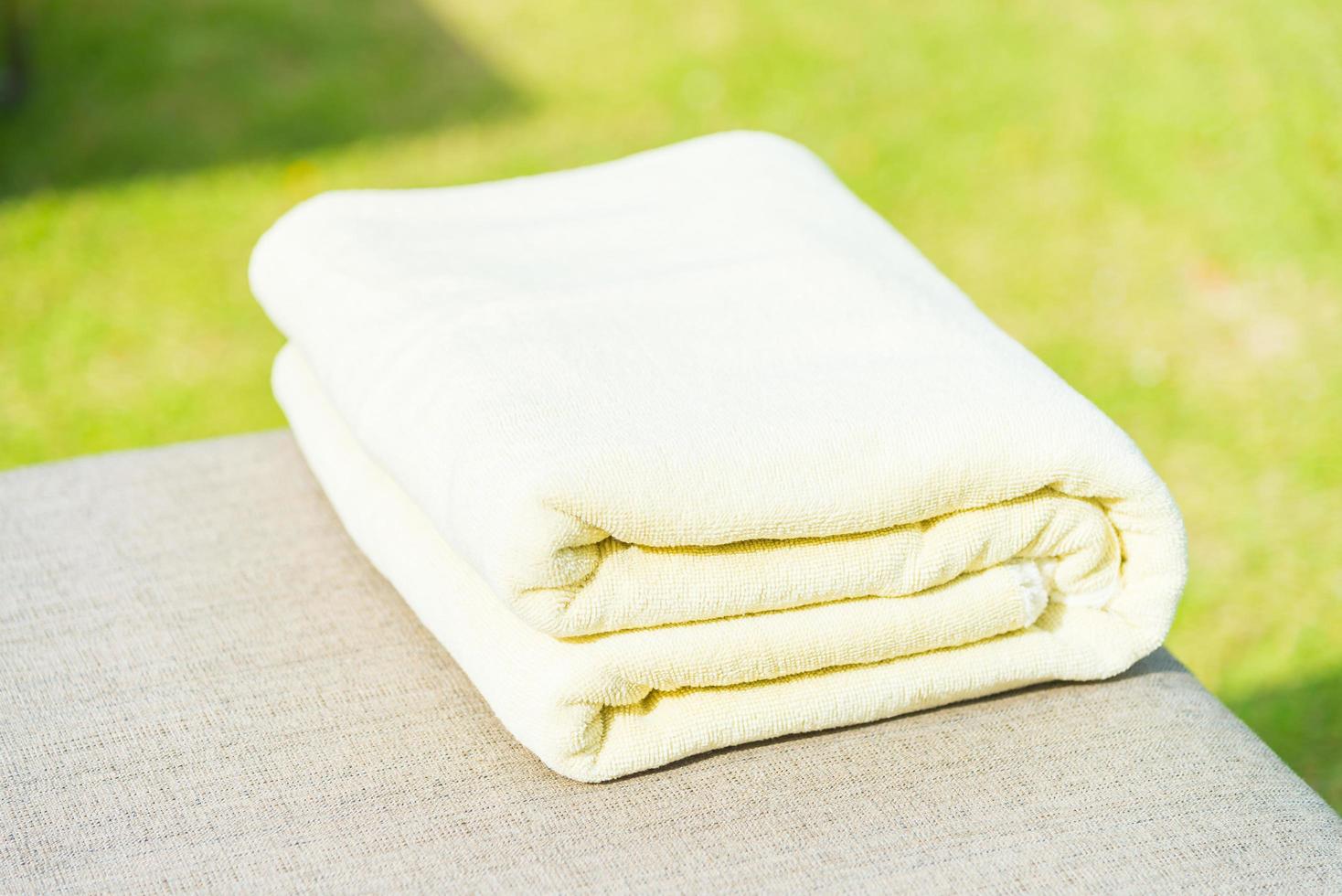 Towel on chair in luxury hotel resort photo