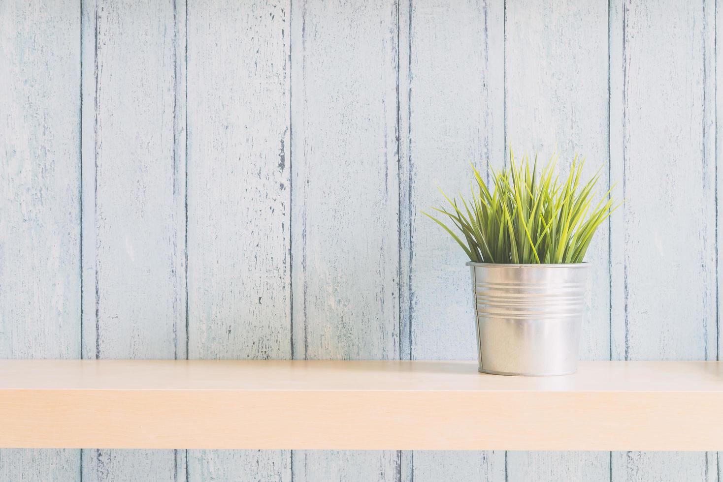 Vase at the wooden wall photo