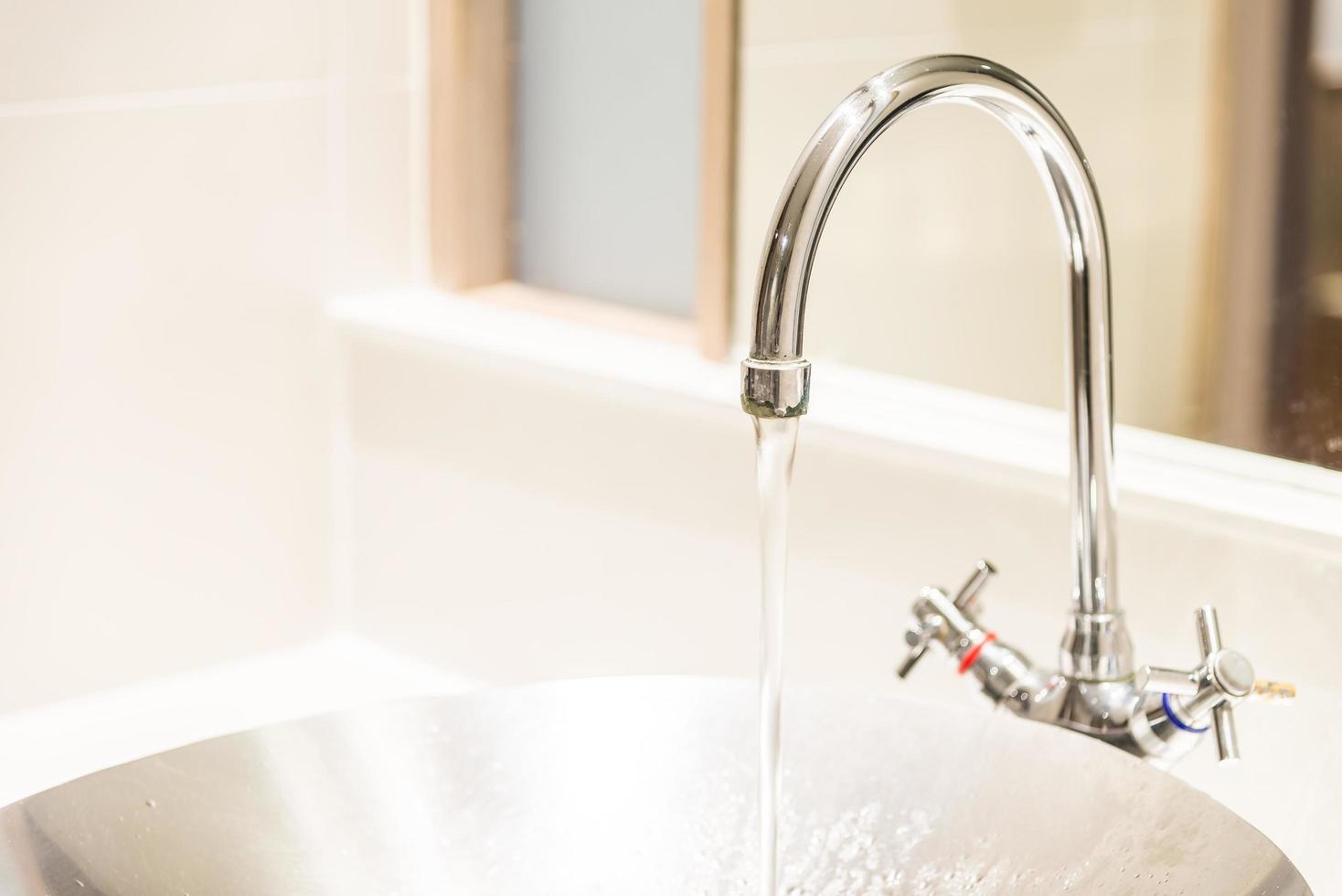 Faucet in toilet photo