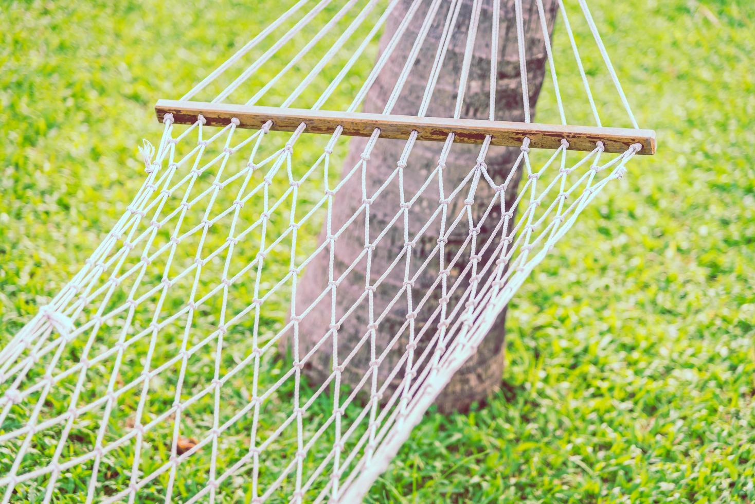 Selective focus point on hammock with green grass background - Filter effect processing photo