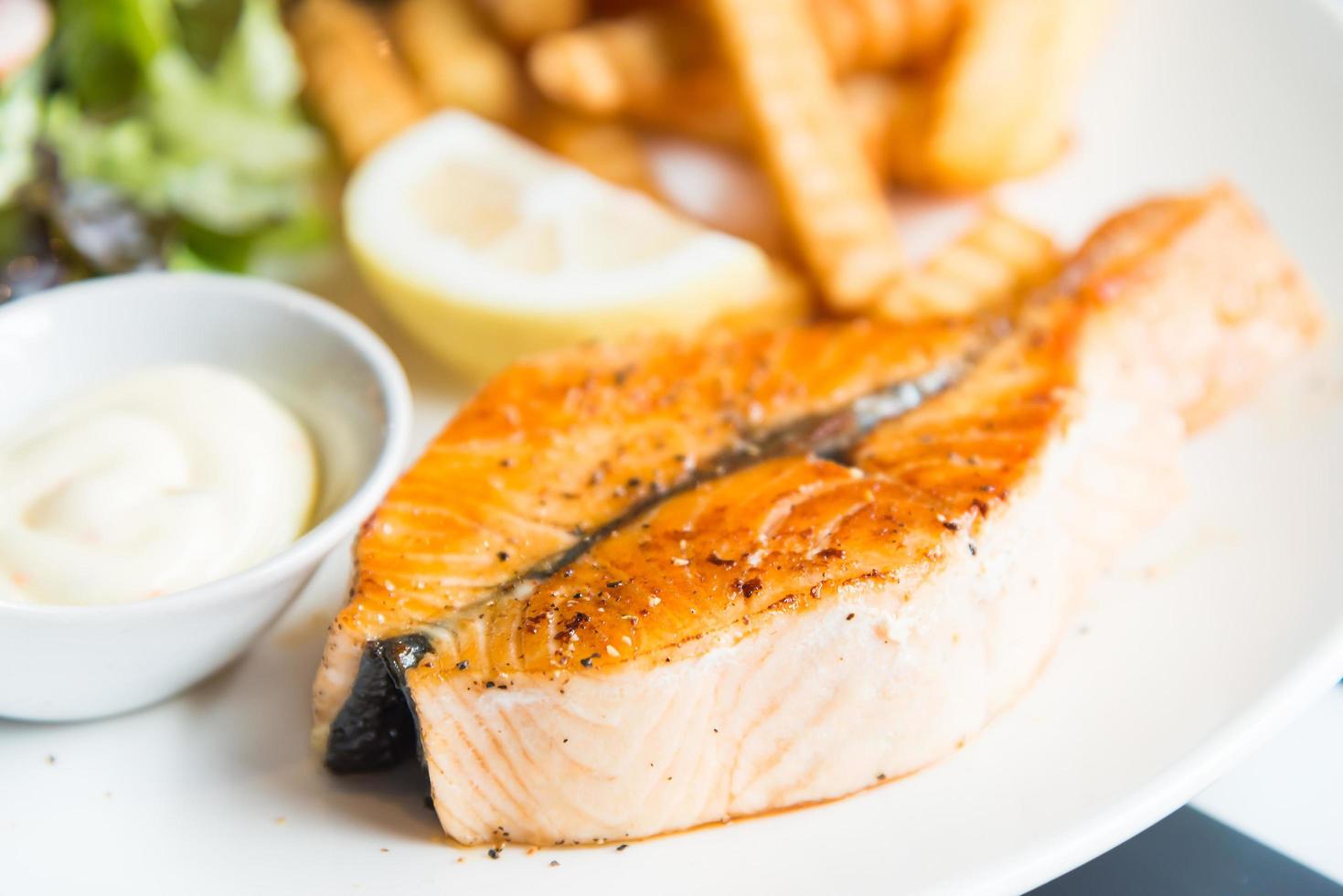 Grilled salmon steak - selective focus point photo