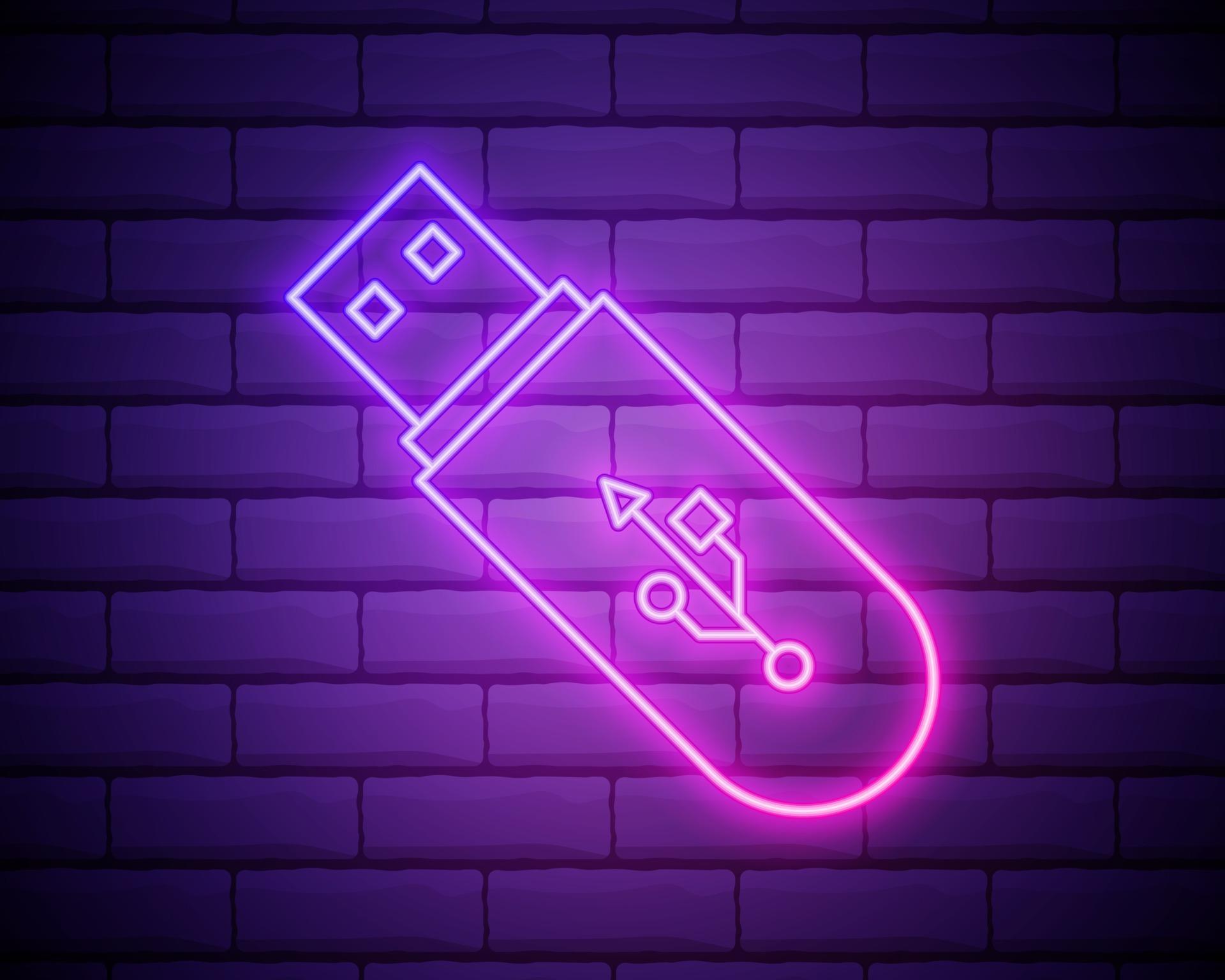 Icono de resplandor de neón del controlador flash USB. línea delgada