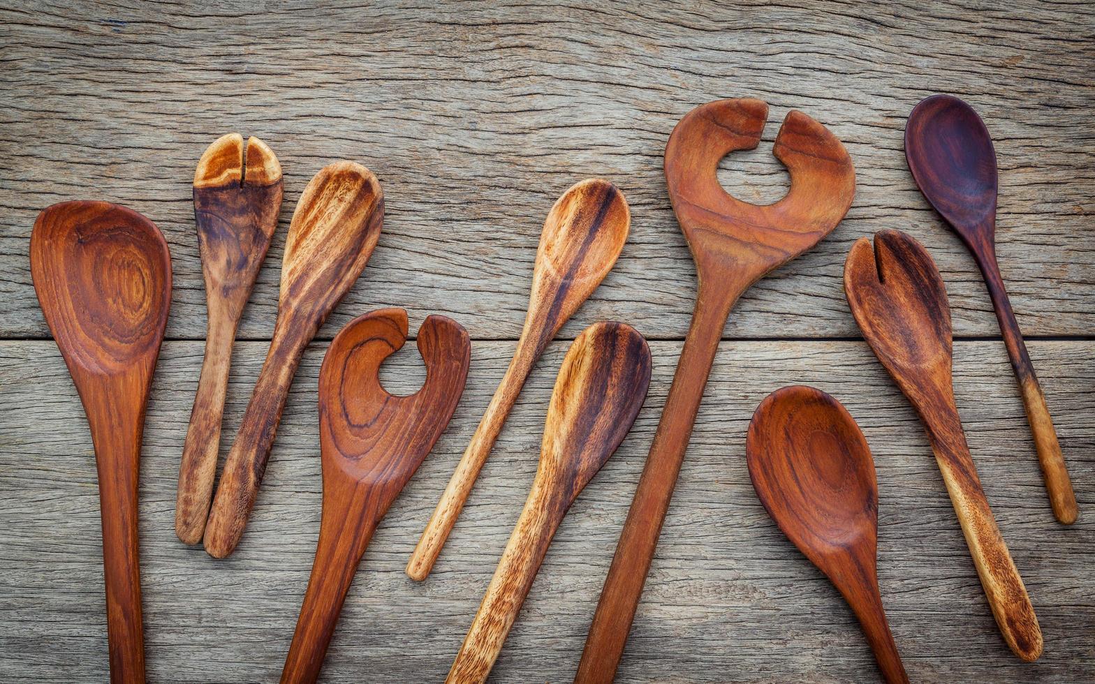 Wooden cooking utensils border photo