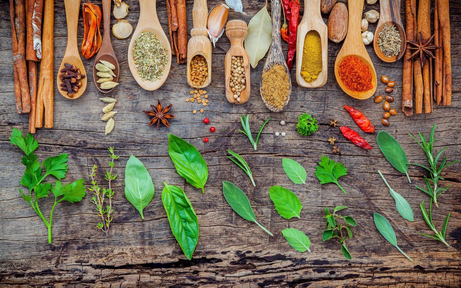 Flat lay of spices ingredients on shabby wooden background photo