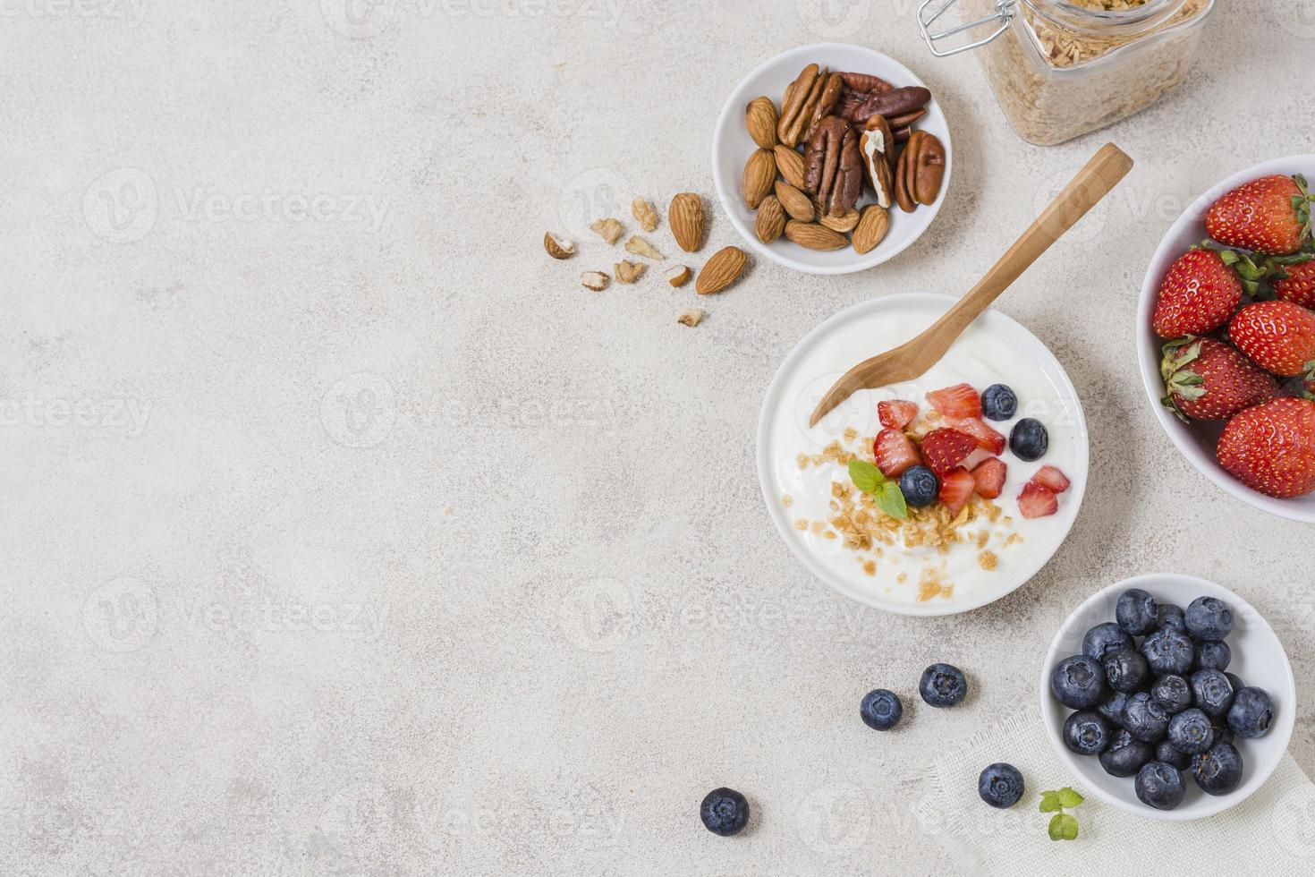 Delicious breakfast with yogurt and fruit photo