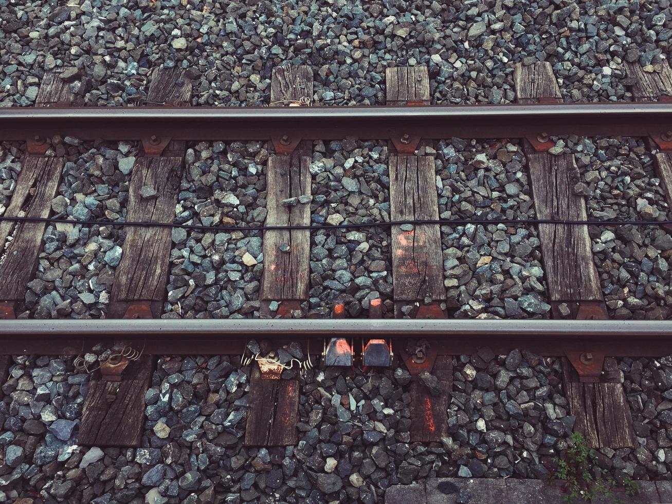 Railroad track in the station, train mode of transportation photo