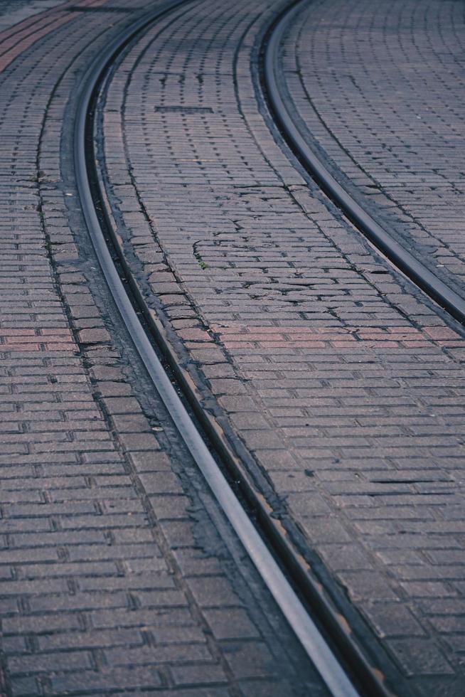 Railroad track in the station, train mode of transportation photo