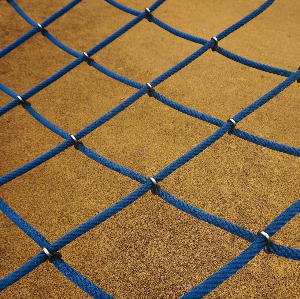 Blue rope net in the playground photo