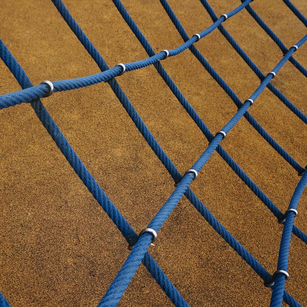 Blue rope net in the playground photo