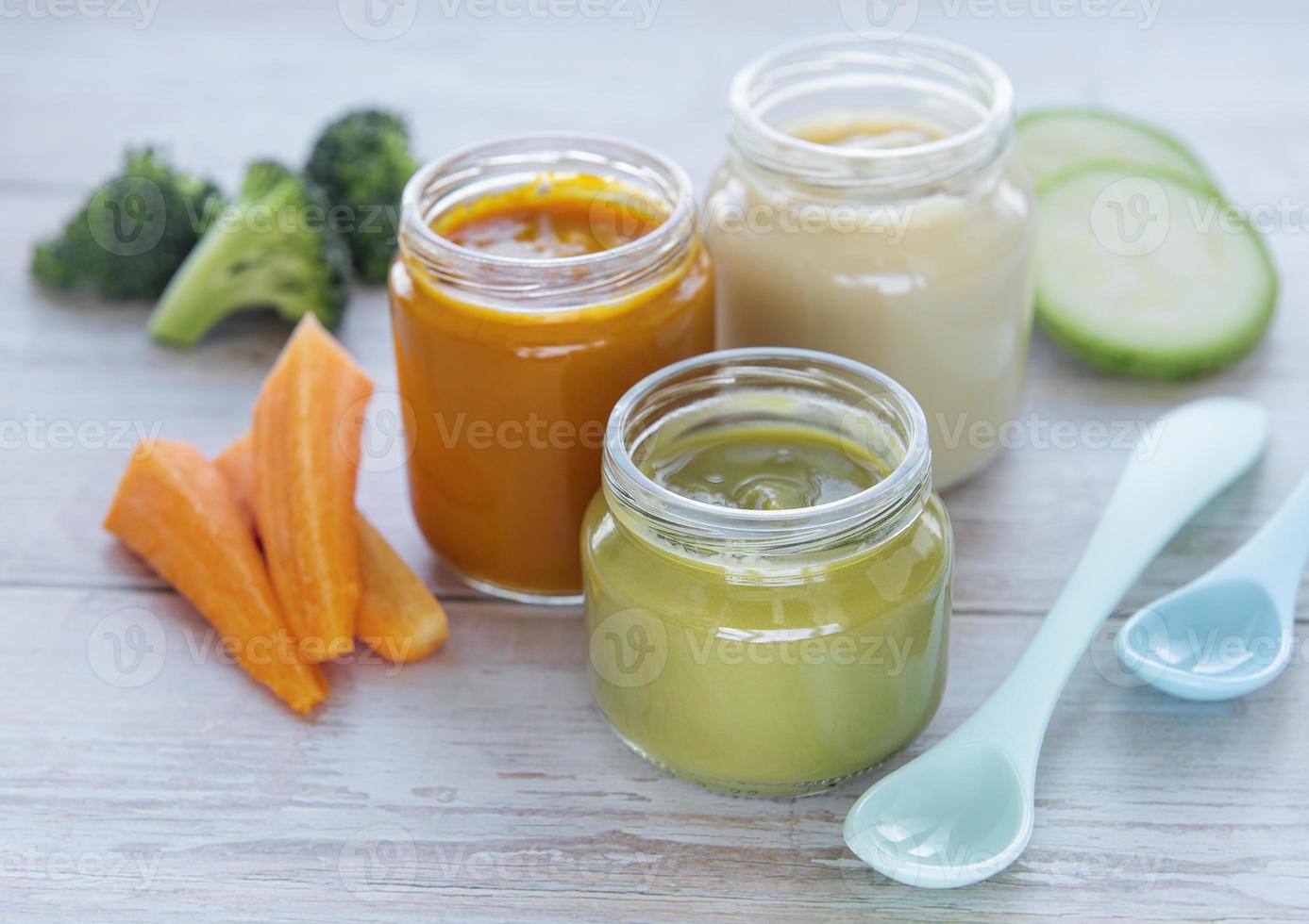 Jars of organic baby food photo