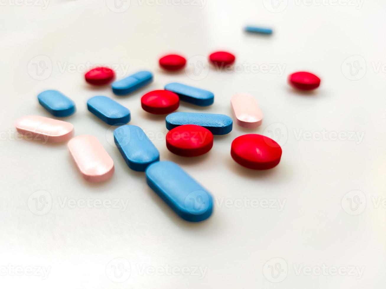 Colorful pills on the table photo