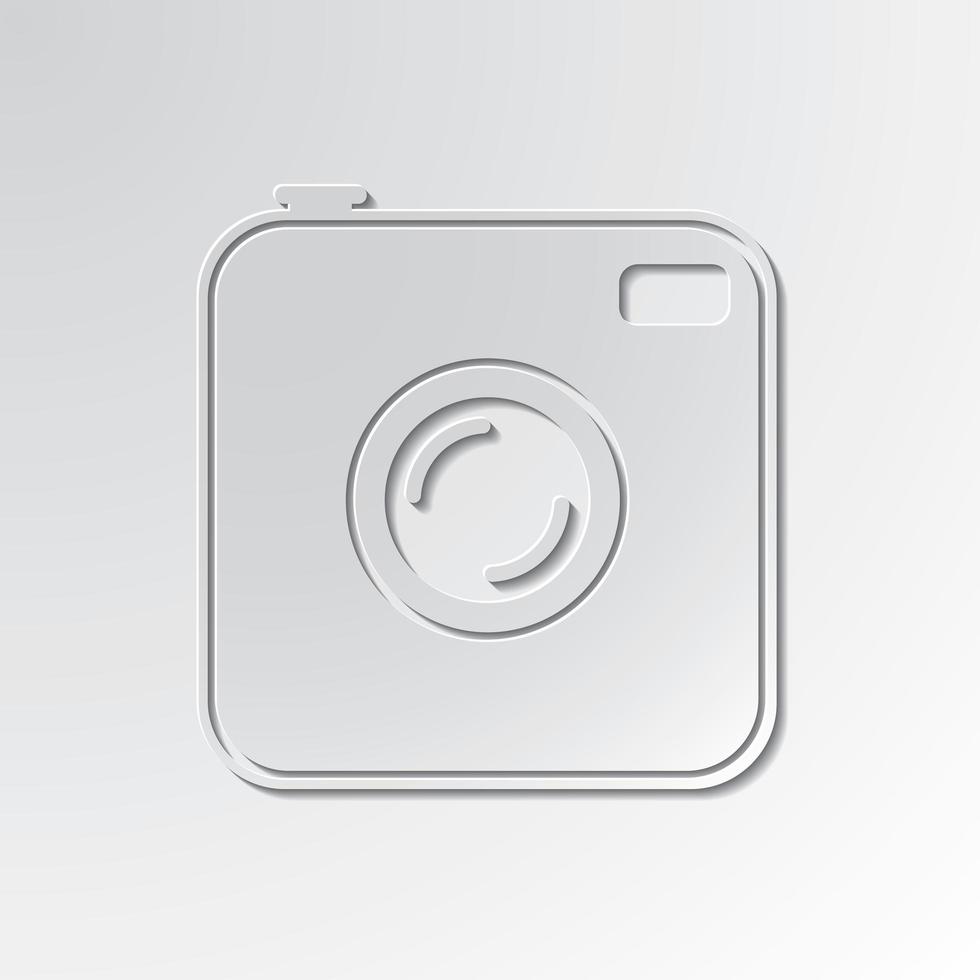 Old photocamera cut out icon on paper background vector