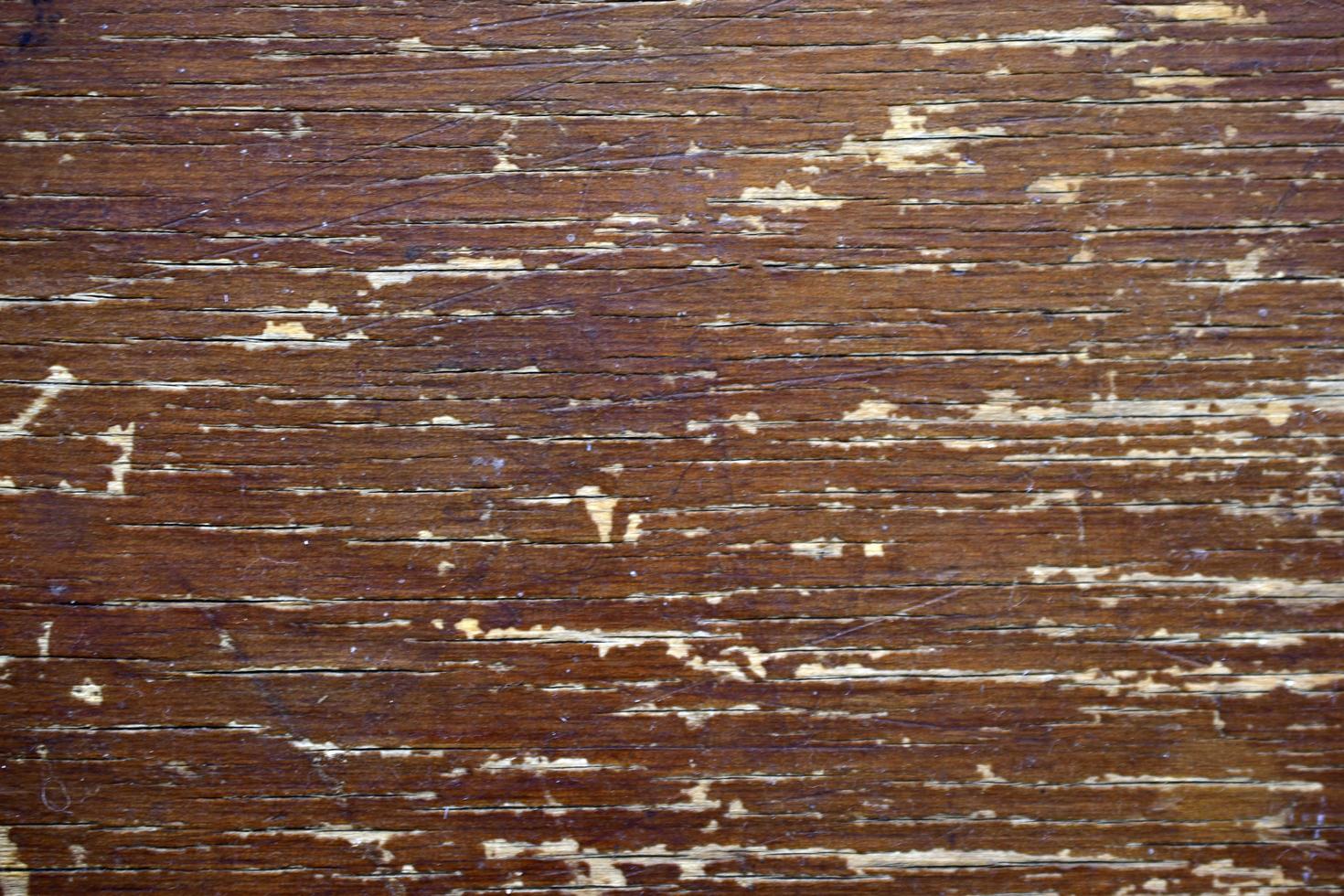 Old wood surface with cracks and paint photo